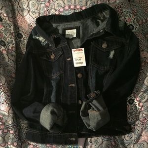 Distressed denim jacket